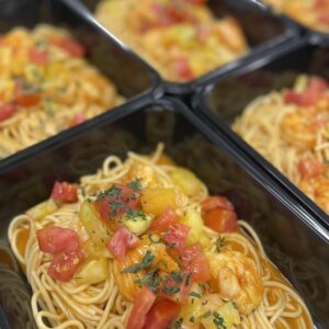 Scampi’s met tomaat-dragonsaus en pasta